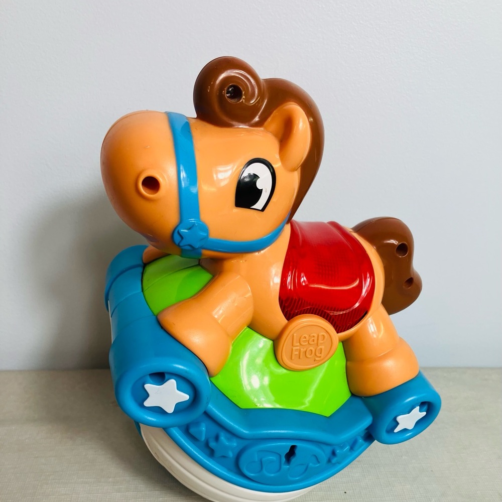 LeapFrog Roll & Go Rocking Horse, an educational electronic toy.